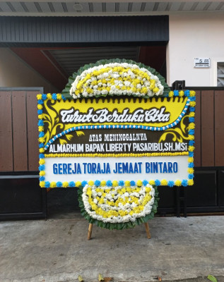 Papan Bunga Duka di Raya Kahean